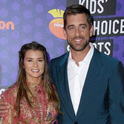 Aaron Rodgers and Danica Patrick attend the Nickelodeon Kids' Choice Sports 2018 at Barker Hangar on July 19, 2018 in Santa Monica, California.