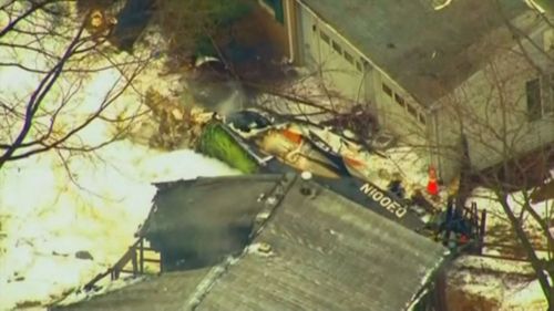 A plane crashed into a home in Maryland, killing three people. (Picture: Supplied)