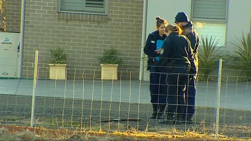 Police investigating the crime scene at Bringelly. Picture: 9NEWS