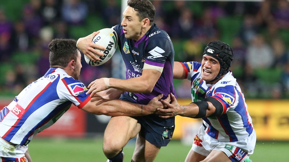 Billy Slater takes on the Knights defence at AAMI Park. (AAP)