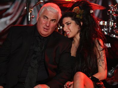 British singer Amy Winehouse with her dad Mitch Winehouse at The Riverside Studios for the 50th Grammy Awards ceremony via video link on February 10, 2008 in London, England.