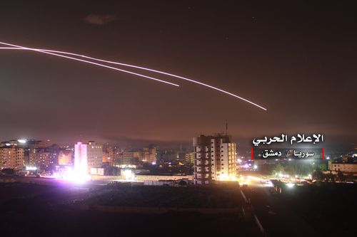 A handout photo made available by government-affiliated Syrian Military Media is said to show Syrian air defense missiles intercepting missile strikes over Damascus, Syria, 09 May 2018 (issued 10 May 2018). According to Syrian official media reports, the air defense was responding to a new wave of Israeli missile strikes. EPA/SYRIAN MILITARY MEDIA HANDOUT 