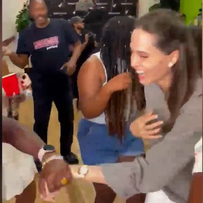 Angelina Jolie dances with daughter Zahara as they celebrate Spelman College placement.