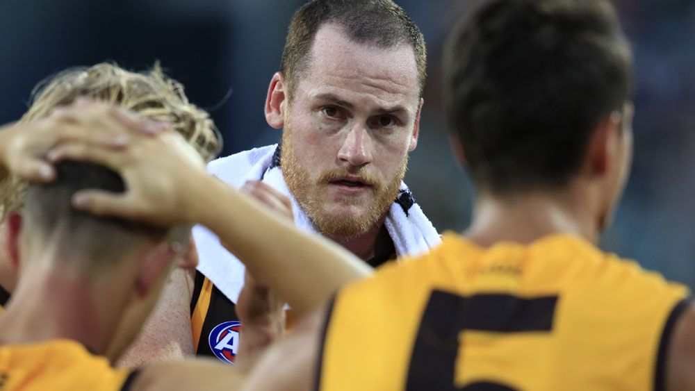 Hawks grab late AFL trial win over Cats as Roughead returns