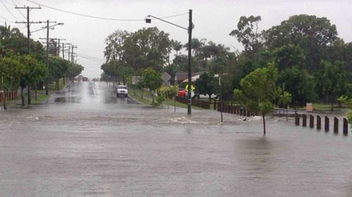 Heavy rainfall caused local flooding on Henderson Road at Burpengary. (Supplied: QFES)