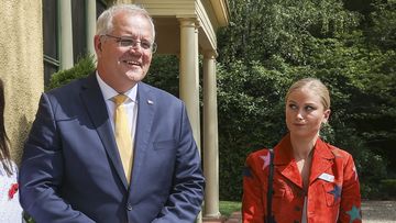 Prime Minister Scott Morrison and 2021 Australian of the Year Grace Tame during the 2022 Australian of the Year awards morning tea at the Lodge in Canberra on Tuesday 25 January 2022. fedpol Photo: Alex Ellinghausen