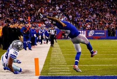 <b>There is no shortage of unbelievable catches in the NFL, but a New York Giants star may have taken the greatest of them all. </b><br/><br/>Footage of the grab shows Odell Beckham Jr wrestle away from his Cowboys opponent and arch his back to take the pass above his head with just his right hand. Incredibly, Beckham managed to stay on his feet and score a touchdown. <br/><br/>The catch was so good it had veteran commentator Cris Collinsworth uttering, "that may be the greatest catch I've ever seen."<br/> <br/>Click through and decide for yourself. <br/>