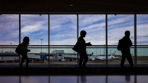 Passengers at Sydney Airport. At present it is difficult to both leave or enter Australia.