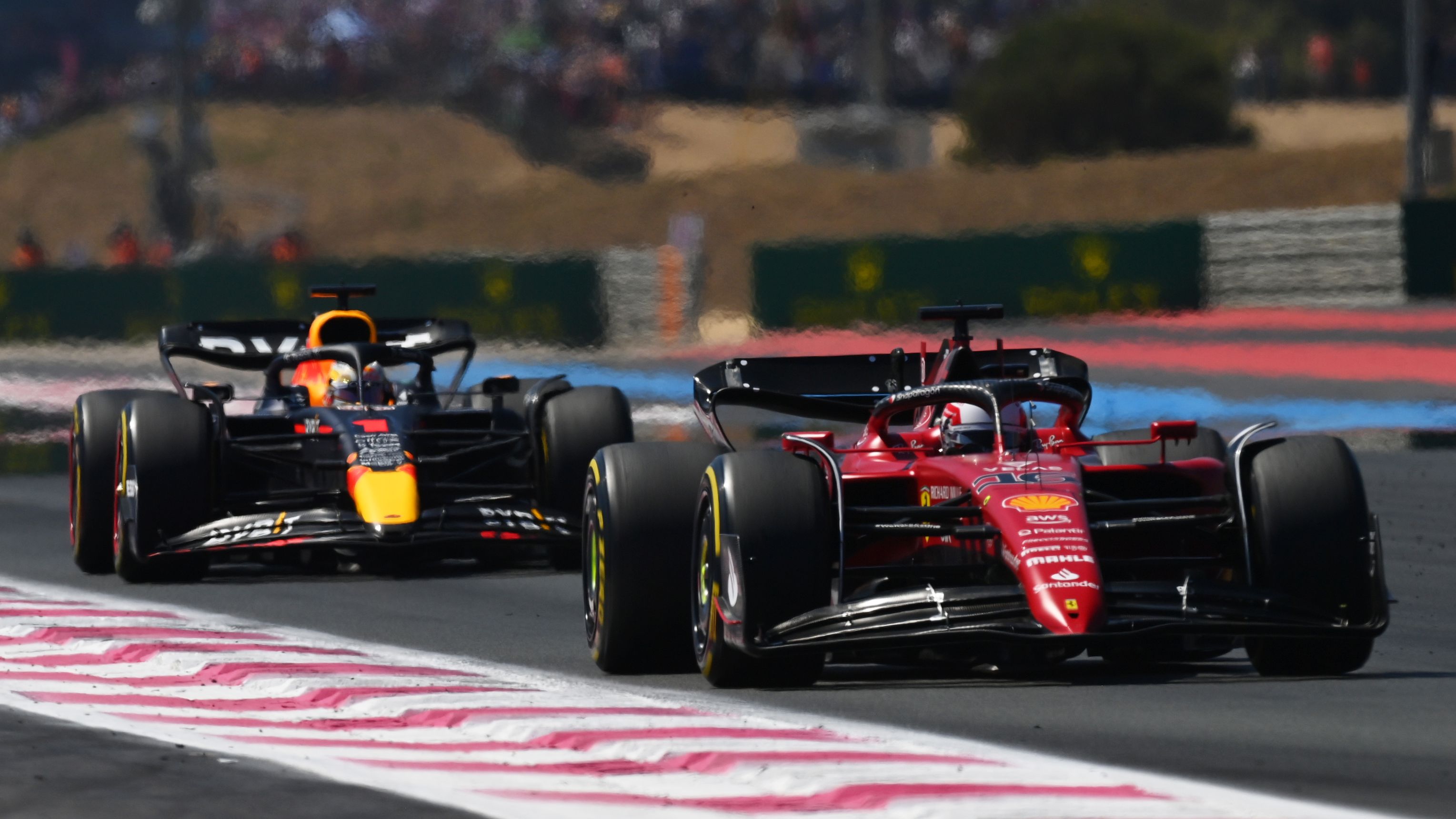Charles Leclerc leads Max Verstappen during the French Grand Prix.