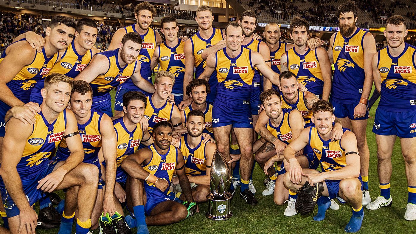 The Eagles pose for a team picture after winning the Derby