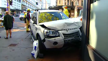 Emergency services were called to the corner of Elizabeth and Goulburn Streets after a crash between a van and a truck where the truck clipped a building.