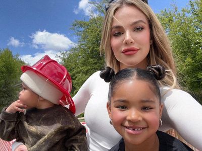 Khloe Kardashian with daughter True and son Tatum. 