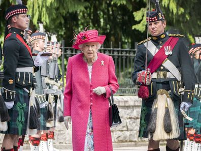 The Queen wears pink outfit for arrival at Balmoral