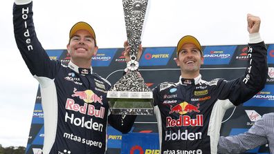 Craig Lowndes and Jamie Whincup celebrate their Sandown 500 victory.