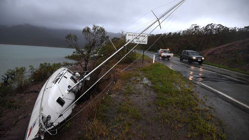 Boats ripped from their moors have been washed ashore. (AAP)