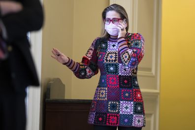 UNITED STATES - DECEMBER 16: Sen. Kyrsten Sinema, D-Ariz., is seen outside a Senate Democrats luncheon in the U.S. Capitol on Thursday, December 16, 2021. (Photo By Tom Williams/CQ Roll Call)