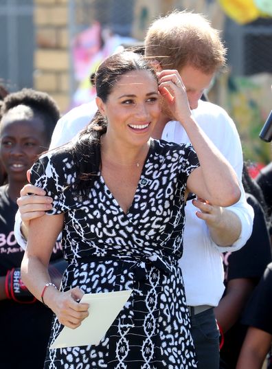 CAPE TOWN, SOUTH AFRICA - SEPTEMBER 23: Meghan, Duchess of Sussex smiles as she visits a Justice Desk initiative in Nyanga township, with Prince Harry, Duke of Sussex, during their royal tour of South Africa on September 23, 2019 in Cape Town, South Africa. The Justice Desk initiative teaches children about their rights and provides self-defence classes and female empowerment training to young girls in the community. (Photo by Chris Jackson/Getty Images)