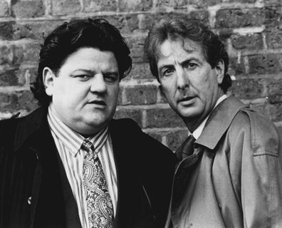 Robbie Coltrane and Brian Hope in "Nuns On The Run" September 20, 1990.