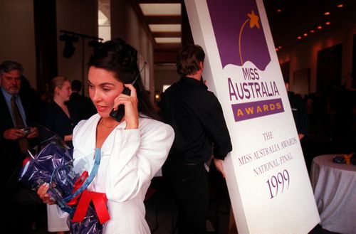 Kathryn Hay (front left, using phone) was named Miss Australia in 1999.