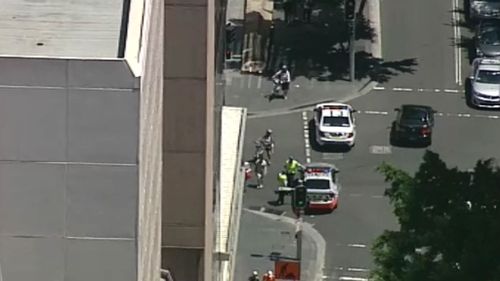 Sydney CBD building fire forces closure of Sussex Street