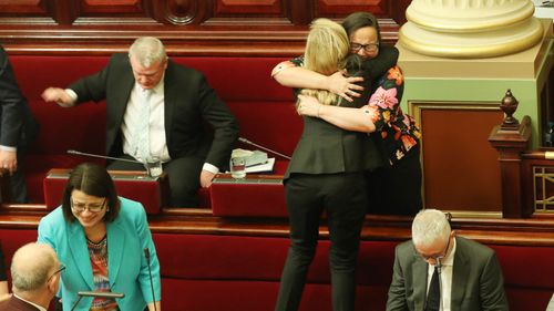 Victorian MPs show emotion after the Voluntary Assisted Dying Bill 2017 passed in the Victorian Legislative Council in Melbourne, Wednesday, November 22, 2017.