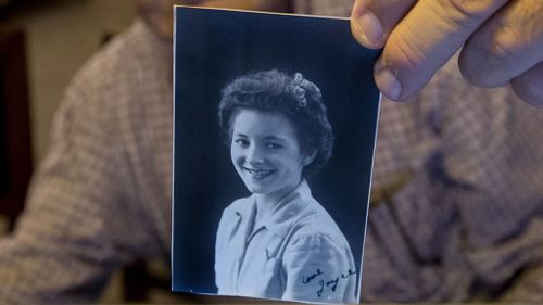 A photo of Joyce taken during WWII. The caption reads 'Love Joyce'. (AAP)