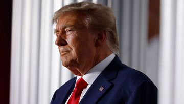 Former US President Donald Trump delivers remarks outside the clubhouse at the Trump National Golf Club on June 13 in Bedminster, New Jersey.