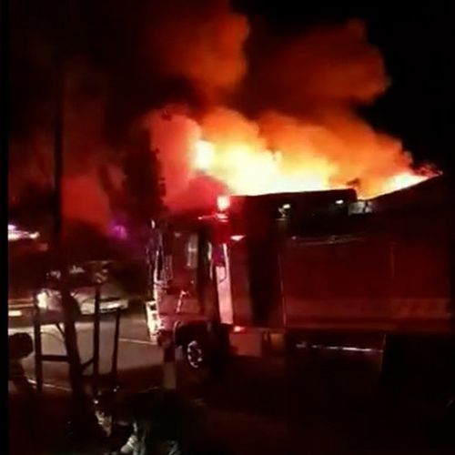 The inferno had already collapsed the home's roof before firefighters arrived.
