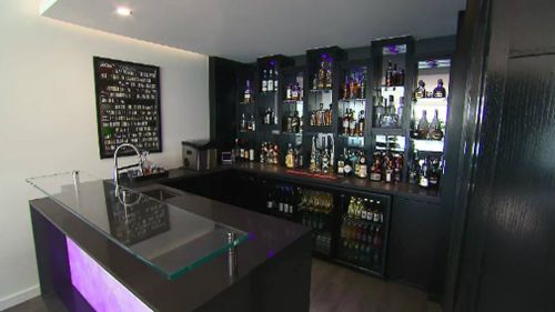 This modern entertainer has a fully stocked bar. Picture: 9NEWS