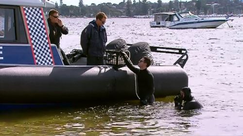 Police divers searched the river for further evidence after the grisly discovery.