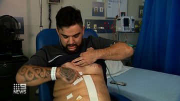 A Queensland father, who was stabbed in an alleged road-rage attack last week, says he is lucky to be alive.