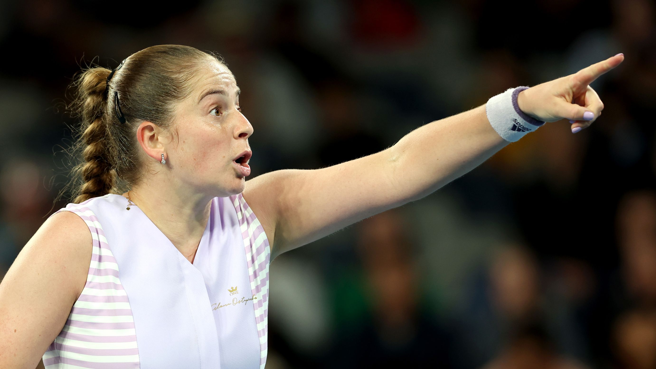 Jelena Ostapenko of Latvia gestures towards the coaching box in her round two singles match against Ajla Tomljanovic.