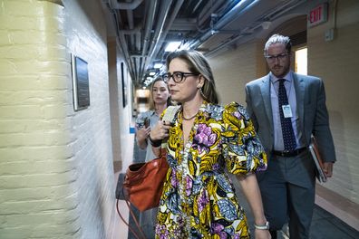 Washington, DC - August 2 : Sen. Kyrsten Sinema, D-Ariz., walks to the Senate floor for a vote on Capitol Hill on Tuesday, Aug 02, 2022 in Washington, DC. (Photo by Jabin Botsford/The Washington Post via Getty Images)