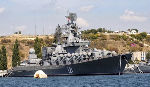 The Russian missile cruiser Moskva, the flagship of Russias Black Sea Fleet is seen anchored in the Black Sea port of Sevastopol, , Thursday, Sept. 11, 2008. The Russian Defense Ministry confirmed the ship was damaged Wednesday, April 13, 2022, but not that it was hit by Ukraine.  The Ministry says ammunition on board detonated as a result of a fire whose causes were being established, and the Moskvas entire crew was evacuated. The cruiser typically has about 500 on board. (AP Photo, Fil