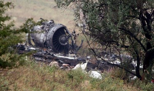 Fragments of the Russian Pulkovo airlines Tupolev 154 plane, on Tuesday, 22 August, 2006. The Russian airplane Tu-154 of Pulkovo Airline Company with 154 passengers (including 45 children and 10 crewmen) crashed today near the Ukrainian city Donetsk, about 600 km on east of capital Kiev. EPA/PHOTOMIG