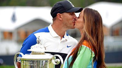 Golfer denies girlfriend a kiss and fans aren't impressed