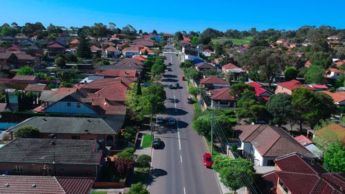 A panoramic aerial view of suburban Sydney housing