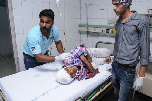 A person who was injured in the train accident undergoes treatment at a hospital in Amritsar.