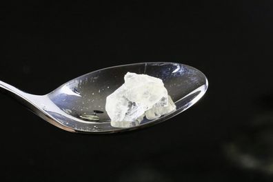 A stock image of crystal methamphetamine in a spoon.