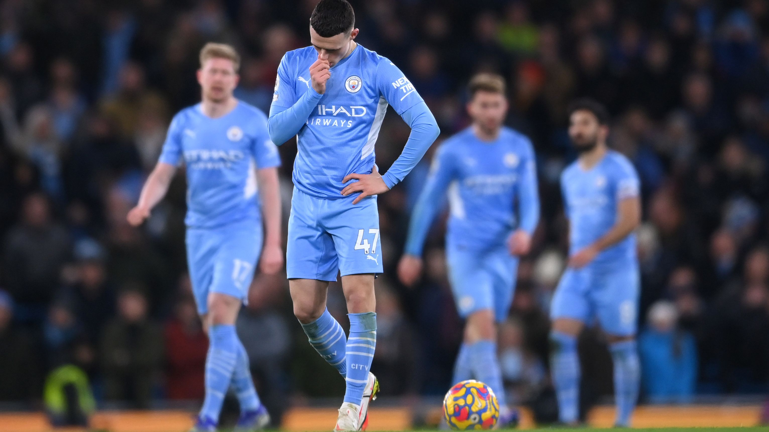 Phil Foden of Manchester City is dejected after their side conceded.