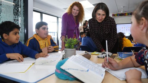 New South Wales Premier Gladys Berejiklian is given a tour of Merrylands Public School in Sydney, Australia.