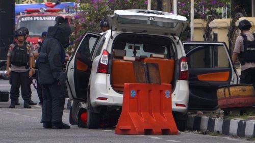 A white minivan drove into the police headquarters in the Riau province, killing at least one officer. Picture: Supplied.