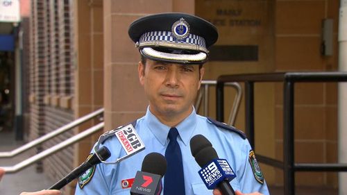 Detective Inspector Michael Boutouridis addresses the media outside Manly Police Station.