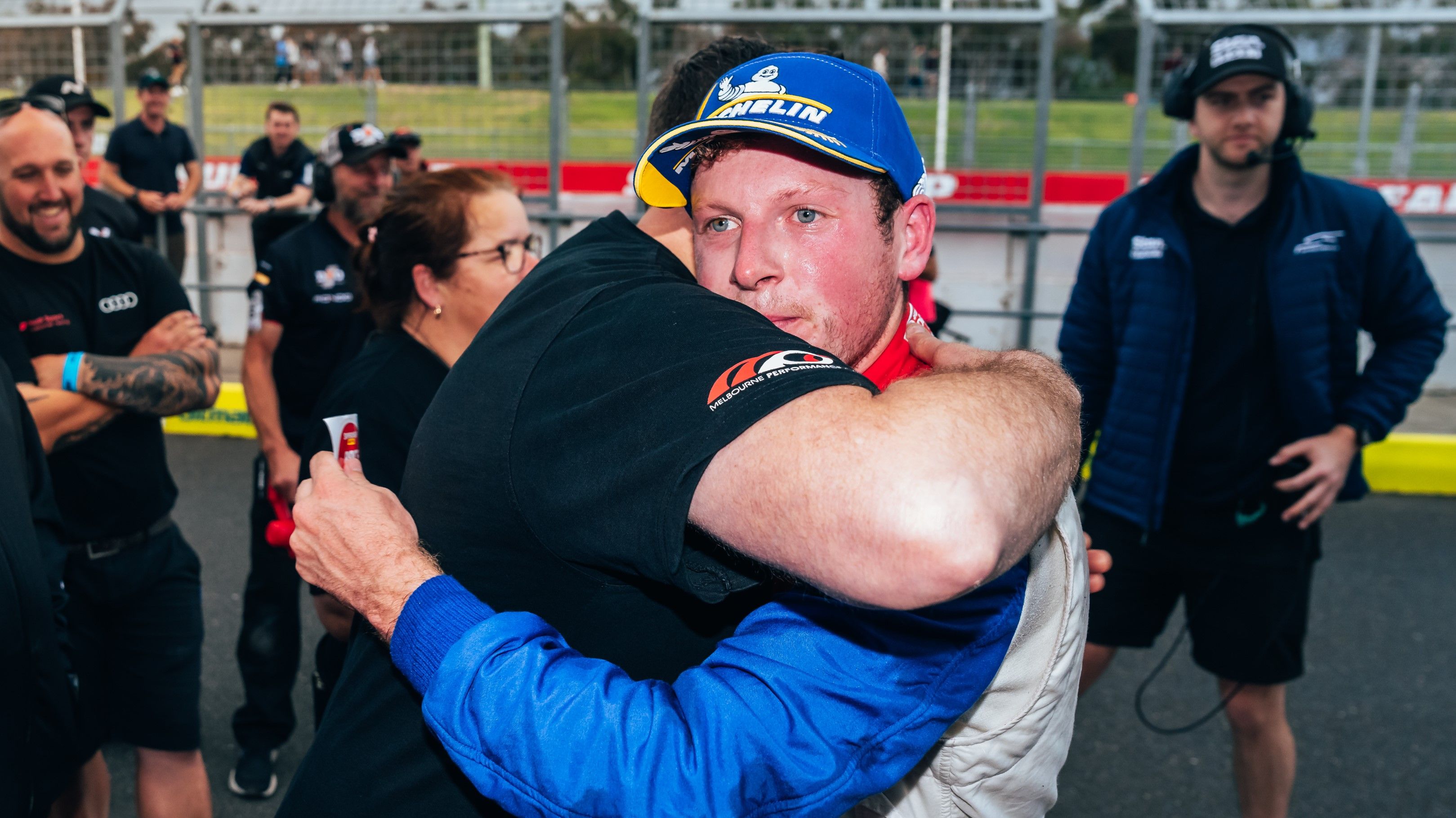 Will Brown embraces one of his Melbourne Performance Centre crew members.