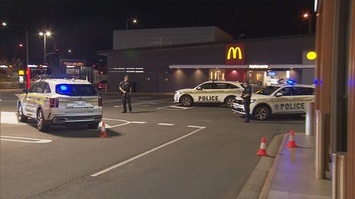 A﻿ man has been arrested after a bomb threat at a McDonald's in Adelaide's north last night. 