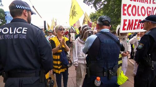 In Sydney, activists dressed as bees have gathered around Hyde Park with arrests already being made.