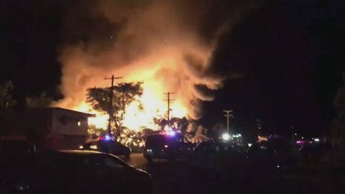 The fire quickly engulfed the two homes. (9NEWS)