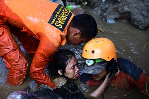 Rescuers are still pulling survivors from collapsed buildings, with voices heard in the rubble.