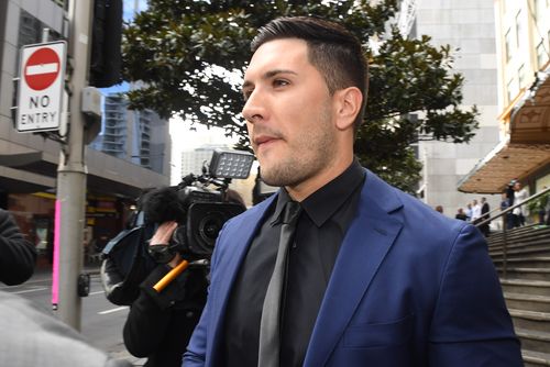 Daniel Rostankovski leaves the Downing Centre Court in Sydney. (AAP)