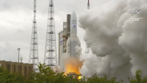 In this image released by NASA, Arianespace's Ariane 5 rocket with NASA's James Webb Space Telescope onboard, lifts off  Saturday, Dec. 25, 2021, at Europe's Spaceport, the Guiana Space Center in Kourou, French Guiana.  The $10 billion infrared observatory is intended as the successor to the aging Hubble Space Telescope.  (NASA via AP)